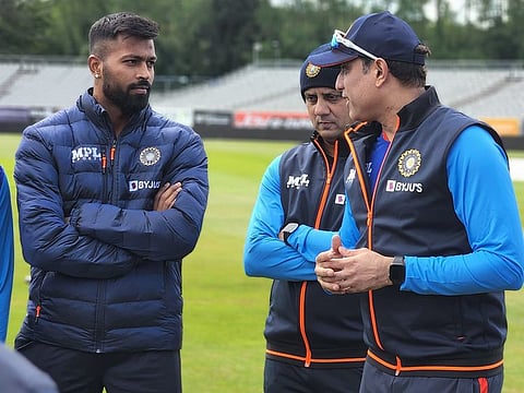 Hardik Pandya (left) and VVS Laxman, stand-in captain and head coach, at a team huddle on the eve of the first T20I against Ireland. The writer questions the justification of such fixtures, which ostensibly seem to be keeping the other member nations and ICC happy.