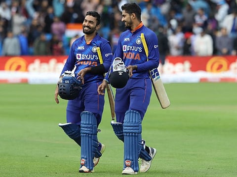 India's Dinesh Karthik (left) and Deepak Hooda celebrate their win in the Twenty20 International cricket match against Ireland in Dublin.