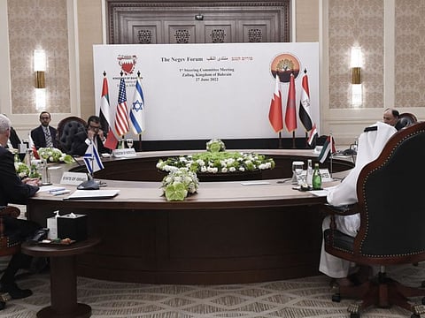 Diplomats take part in the Negev Forum's first Steering Committee meeting in the town of in Zallaq, south of the Bahraini capital of Manama, on June 27, 2022.