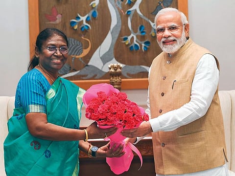 Indian Prime Minister Narendra Modi meets National Democratic Alliance (NDA) presidential candidate Draupadi Murmu in New Delhi on June 23, 2022.