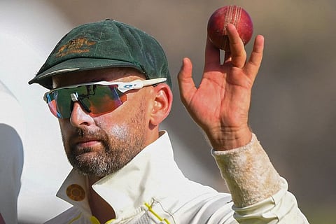 Australia's Nathan Lyon celebrates after taking five-wicket haul on the first day of the first Test against Sri Lanka at Galle on Wednesday.