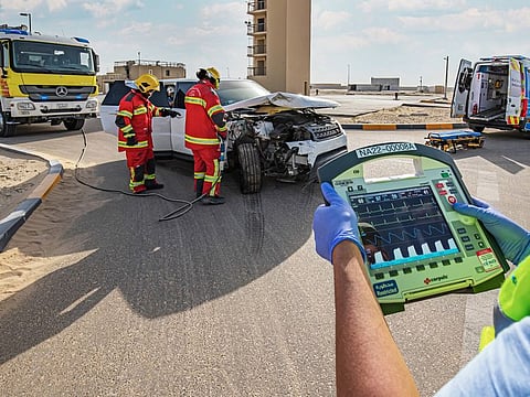 A remote-monitoring device being used during the rescue of a person from an accident site by National Ambulance personnel.