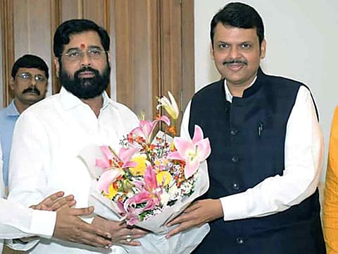 Rebel Shiv Sena leader Eknath Shinde meets BJP leader Devendra Fadnavis, at the latter's residence in Mumbai on Thursday.