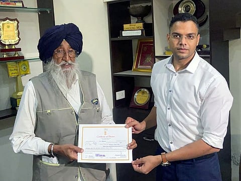 Shiromani Akali Dal (SAD) leader Simranjit Singh Mann receives the MP certificate after winning the Lok Sabha bypoll, in Sangrur, Punjab, on June 26, 2022.