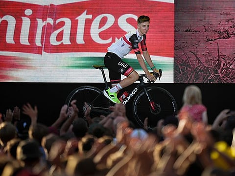 Show-stopper: 2020 and 2021 Tour de France winner Tadej Pogacar of Slovenia rides on the podium during the team presentation ahead of the Tour de France cycling race in Copenhagen, Denmark on Wednesday night.