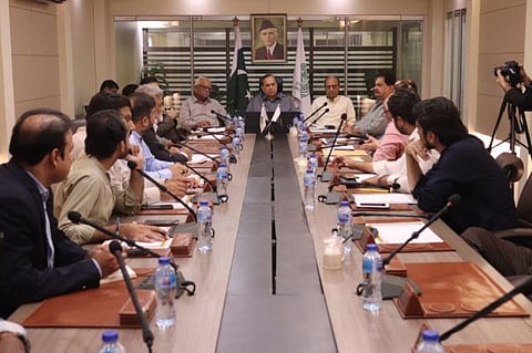Officials meeting on deteriorating electricity situation in Karachi.
