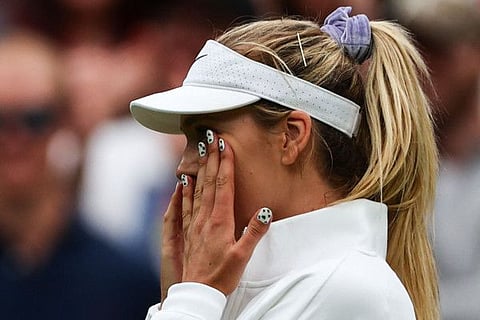 Britain's Katie Boulter cries after defeating Czech Republic's Karolina Pliskova in the women's singles on the fourth day of the Wimbledon Championships.