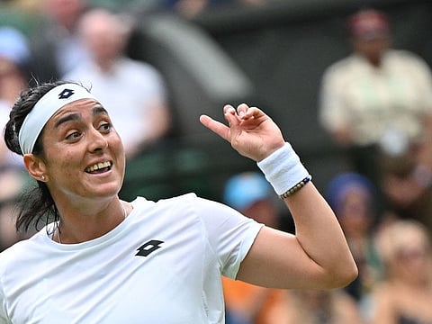 Tunisia's Ons Jabeur looks pleased during her demolition of France's Diane Parry during their women's singles third round match on Friday.