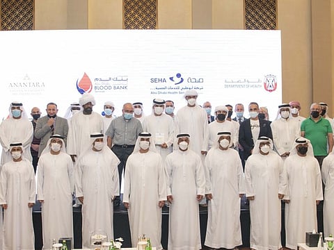 Blood donors during honouring ceremony in Abu Dhabi. A total of 25,600 donors have already donated 44,000 units of blood in Abu Dhabi this year.