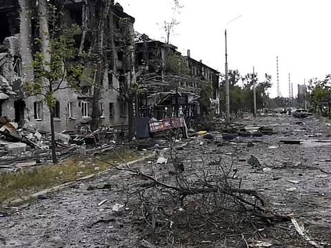 In this photo provided by the Luhansk region military administration, damaged residential buildings are seen in Lysychansk, Luhansk region, Ukraine, early on July 3, 2022.