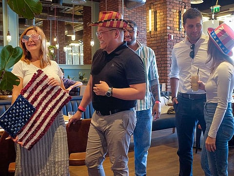 For some American expats in the UAE, the celebrations began over the weekend itself. Seen above are a group of expats at a gathering in Dubai on Saturday.