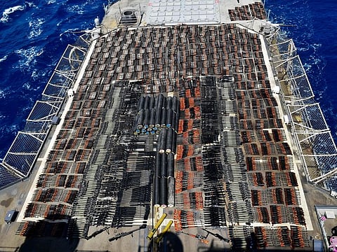 Weapons that the US Navy described as coming from a hidden arms shipment aboard a stateless dhow are seen aboard the guided-missile cruiser USS Monterey, May 8, 2021.