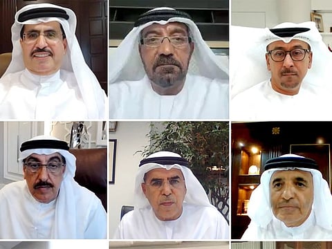 Sheikh Ahmed bin Saeed Al Maktoum, Chairman of the Dubai Supreme Council of Energy, and Saeed Mohammed Al Tayer, Vice Chairman of the Dubai Supreme Council of Energy, along with other participants.