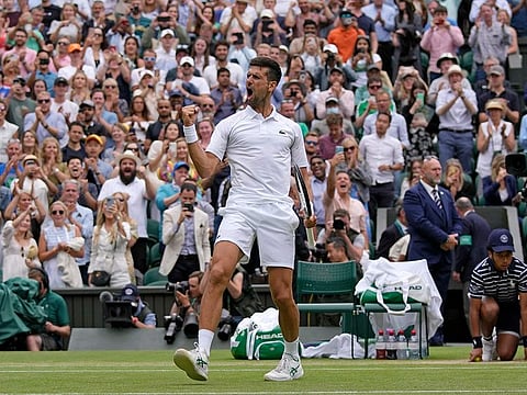 World No.1 Novak Djokovic lets out a war cry after rallying hard to beat 20-year-old Italian Jannik Sinner in a five-setter to make the semi-final.