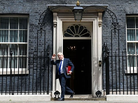 British Prime Minister Boris Johnson leaves 10 Downing Street for Parliament in London, Britain, on July 6, 2022. Johnson will announce his resignation on July 7, 2022, a government source said, after he was abandoned by ministers and his Conservative Party's lawmakers who said he was no longer fit to govern.