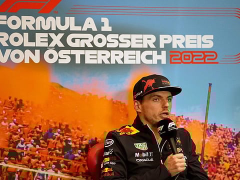 Red Bull driver Max Verstappen of the Netherlands answers to questions of journalists during a news conference ahead of the Austrian Formula One Grand Prix at the Red Bull Ring racetrack in Spielberg, Thursday, July 7, 2022. The Austrian F1 Grand Prix is held on Sunday July 10, 2022. (AP Photo/Matthias Schrader)