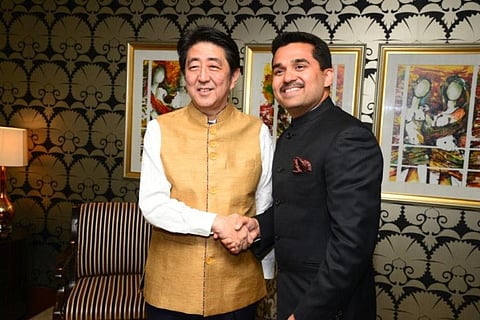 Dr Shamsheer Vayalil with former Japanese Prime Minister Shinzo Abe after gifting him the golden jacket during Abe's visit to India in 2015.