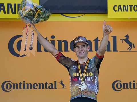 Belgian rider Wout van Aert flashes a thumbs up after winning the eighth stage of Tour de France on Saturday.