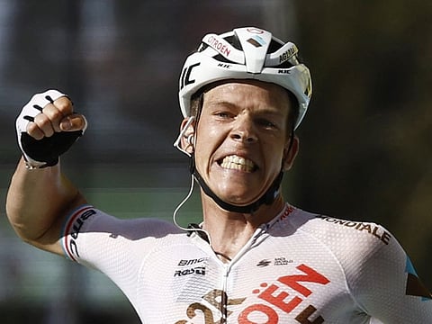AG2R Citroen Team's Bob Jungels celebrates as he crosses the finish line to win stage 9 of the Tour de France between Aigle to Chatel les Portes du Soleil in France on Sunday.