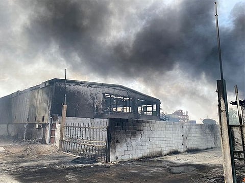 The warehouse that caught fire in Abu Dhabi on Sunday afternoon.