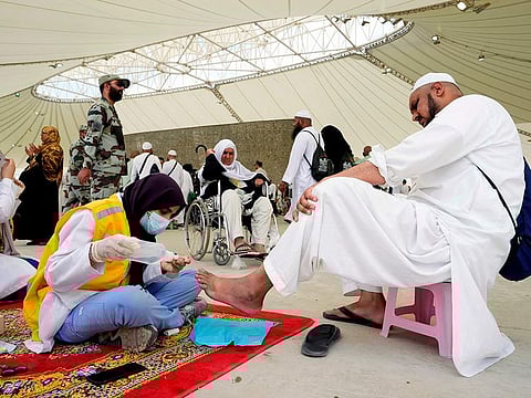 A pilgrim being treated at a clinic during the Hajj.