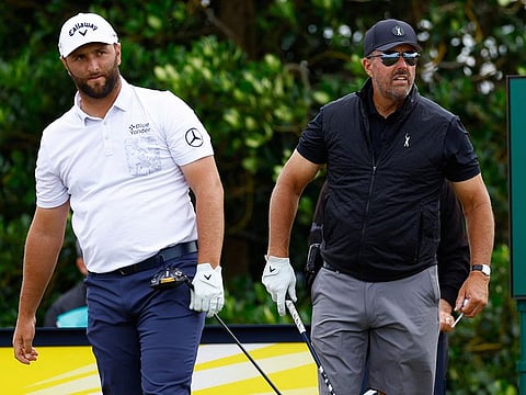 Jon Rahm (left) and Phil Mickelson during a practice round at the St. Andrews on Tuesday. Mickelson, a left-hander, had the advantage of the breeze during the day.