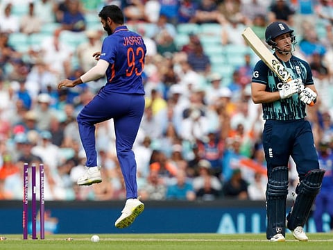 Indian pacer Jasprit Bumrah celebrates the wicket of Liam Livingstone (right) during the first One Day International against England at The Oval in London on Tuesday.