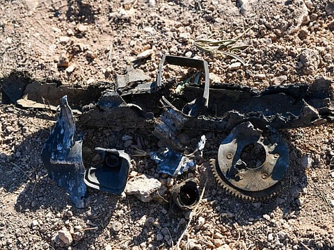 A picture shows debris at the site where a US drone targeted Maher Al Agal near the village of Khaltan, near Jindires in northern Syria, on July 12, 2022.