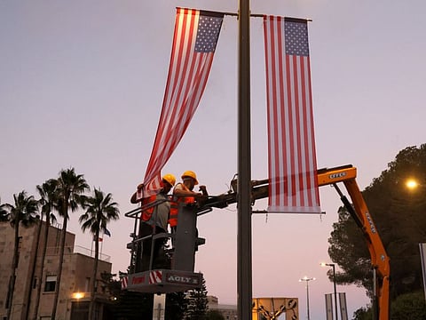 Flags of the US are hung up along streets by the Jerusalem municipality ahead of US President Joe Biden's upcoming visit to Israel.