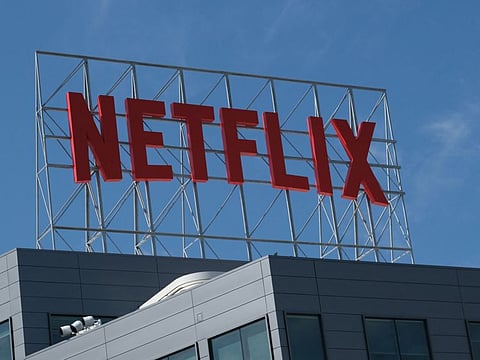 In this file photo taken on March 2, 2022 the Netflix logo is seen on top of their office building in Hollywood, California.