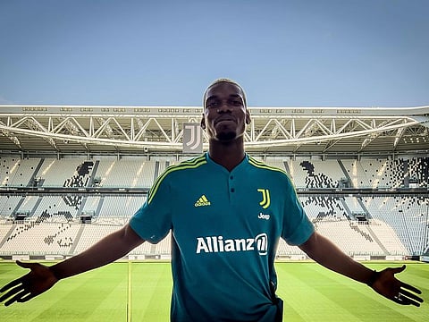 All smiles... Paul Pogba is delighted to be back at Juventus after ending his miserable spell at Manchester United.