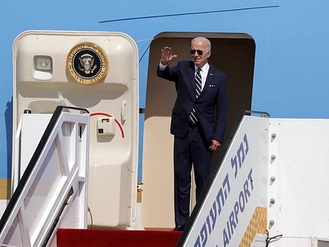 Biden waves before his departure to Saudi Arabia from Ben Gurion airport in Lod near Tel Aviv, on July 15, 2022.
