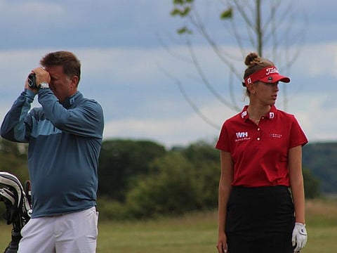 Chiara Noja with her dad-cum-caddy Tom during third round action of LETAS Tour event in Scotland.
