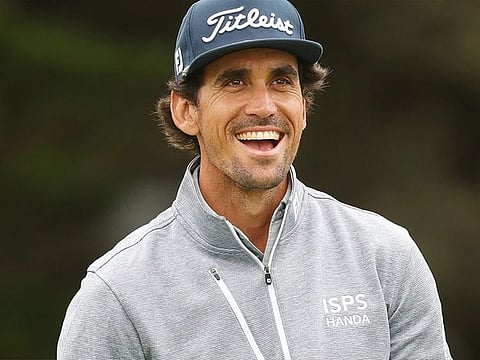 A smiling Rafa Cabrera Bello on the golf course.