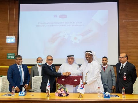 Burjeel Hospital and RAKMHSU officials exchanging MoU documents during the signing ceremony held at Burjeel Hospital Abu Dhabi