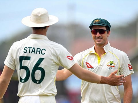 Australia's captain Pat Cummins (right) will miss the Zimbabwe and New Zealand series.