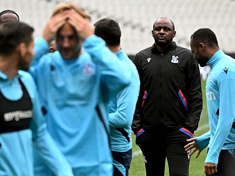 Crystal Palace manager Patrick Vieira (second right) watches his players during a training session at the Melbourne Cricket Ground (MCG) in Melbourne ahead of their pre-season football friendly against Manchester United tomorrow.