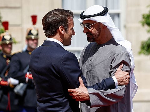 French President Emmanuel Macron welcomes UAE President His Highness Sheikh Mohamed bin Zayed Al Nahyan as he arrives for a meeting at the Elysee Palace in Paris, France on July 18, 2022.