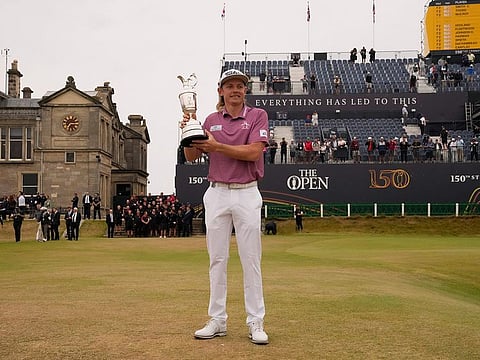 Cameron Smith of Australia shows off the claret jug trophy after winning the British Open golf championship on the Old Course at St. Andrews, Scotland - a venue steeped in tradition and history.