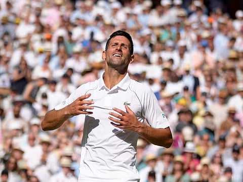 Serbia's Novak Djokovic celebrates after beating Australia's Nick Kyrgios to win the Wimbledon title final earlier this month. The Serb, who is in the US Open list, is still unsure of his participation due to his vaccination status.