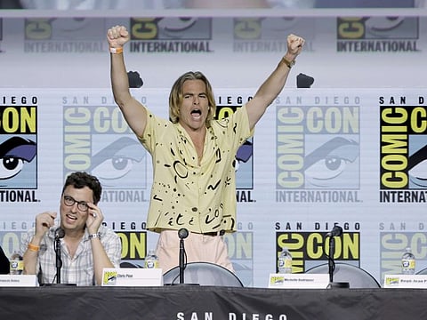 John Francis Daley and Chris Pine speak onstage at the "Dungeons & Dragons: Honor Among Thieves" panel during 2022 Comic-Con International: San Diego at San Diego Convention Center on July 21, 2022 in San Diego, California.
