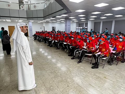 Labourers attending a training session conducted by the Permanent Committee for Labour Affairs in Dubai.