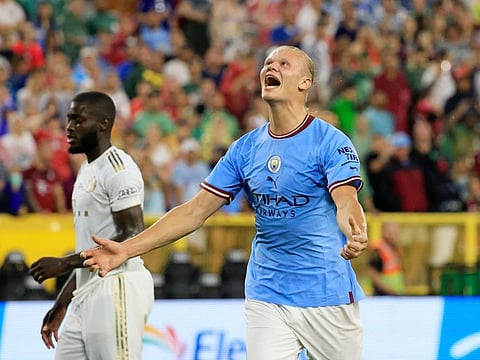 Erling Haaland of Manchester City celebrates after scoring against Bayern Munich during a pre-season friendly in Green Bay, Wisconsin.