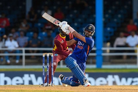 Axar Patel of India hits a 4 during the 2nd ODI match against the West Indies at Queens Park Oval, Port of Spain, Trinidad and Tobago.