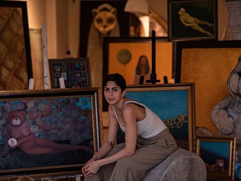 Hana Afifi exhibits and sells her art at home.