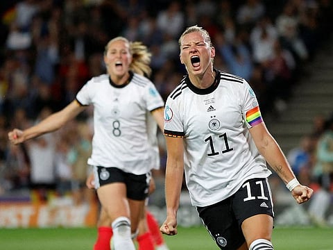 Germany's Alexandra Popp celebrates scoring their second goal with teammates.