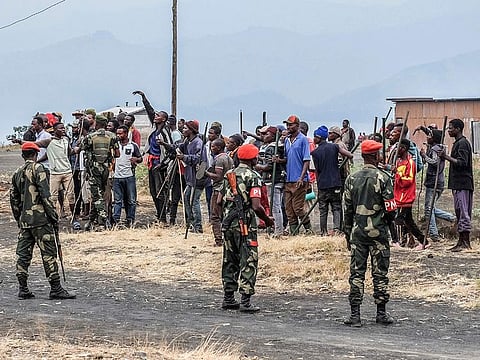 Demonstrators face police during a protest against the United Nations peacekeeping force (MONUSCO) deployed in the Democratic Republic of the Congo in Sake, some 24km west of Goma, Wednesday July 27, 2022.
