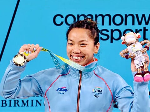 Weightlifter Mirabai Chanu celebrates with the gold in the women's 49kg at the Commonwealth Games 2022 in Birmingham on Saturday.