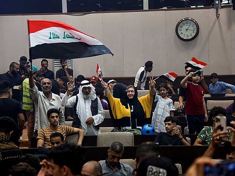 Supporters of Iraqi cleric Moqtada Al Sadr gather during a sit-in at the parliament building, amid political crises in Baghdad, Iraq July 31, 2022.