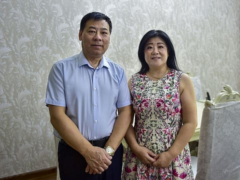 Cheng Fu Qiang and his wife Shou Qi Chao at their residence in The International City in Dubai.